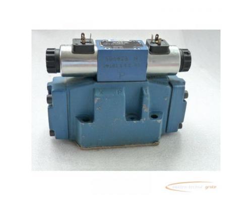 Mannesmann Rexroth 4 WE 6 J62/EG24N9K4 Hydraulikventil 24 V Spulenspannung kompl. mit Steuerblock 4 - Bild 1